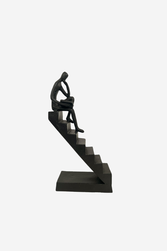 Cast Iron Sculpture - Reading on Stairs