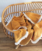 Organic Muslin Blanket with Tassels - Saffron